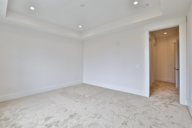 1 Highland Ave Unit 309, Fort Thomas, KY 41075 - empty room with a tray ceiling, carpet floors, recessed lighting, and baseboards