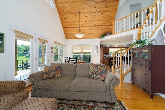 350 Leon Blvd, Williamstown, KY 41097 - living room featuring high vaulted ceiling, light wood-style flooring, stairway, and wood ceiling