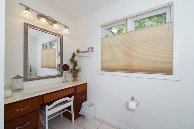 350 Leon Blvd, Williamstown, KY 41097 - bathroom with vanity, tile patterned flooring, and baseboards