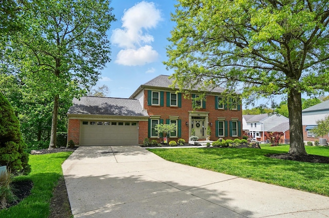 856 Moonstone Ct, Crescent Springs, KY 41017 - colonial-style house with brick siding, a garage, a front yard, and concrete driveway