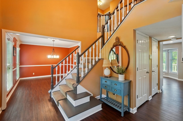 856 Moonstone Ct, Crescent Springs, KY 41017 - stairway with baseboards, wood finished floors, a chandelier, and crown molding