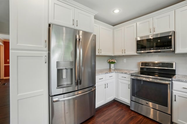 856 Moonstone Ct, Crescent Springs, KY 41017 - kitchen featuring stainless steel appliances, dark wood finished floors, white cabinetry, backsplash, and light stone countertops