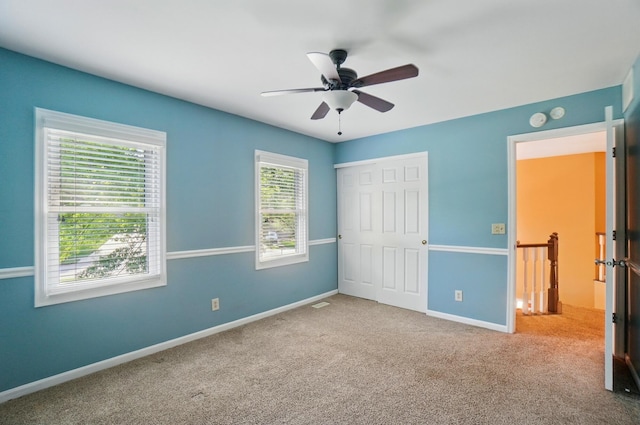 856 Moonstone Ct, Crescent Springs, KY 41017 - unfurnished bedroom featuring a closet, baseboards, carpet, and ceiling fan
