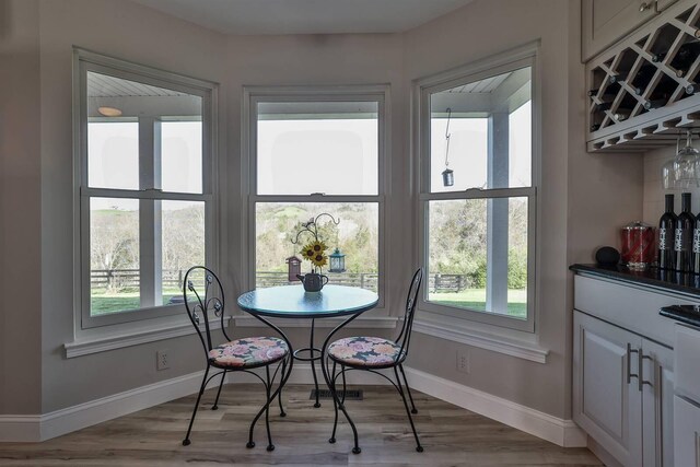 8949 E Main St, Alexandria, KY 41001 - dining area featuring plenty of natural light, baseboards, and wood finished floors