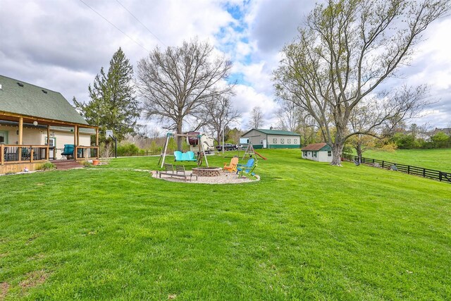 8949 E Main St, Alexandria, KY 41001 - view of yard featuring an outdoor fire pit and a deck