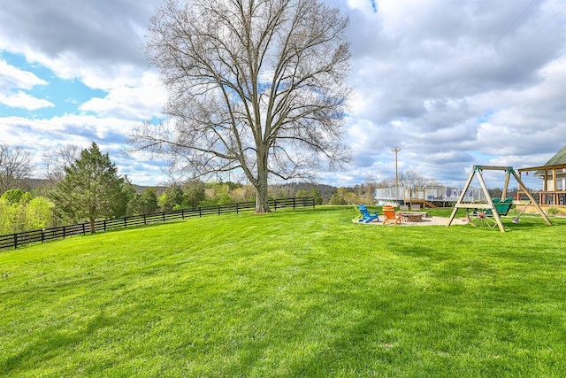 8949 E Main St, Alexandria, KY 41001 - view of yard featuring a fire pit and a playground