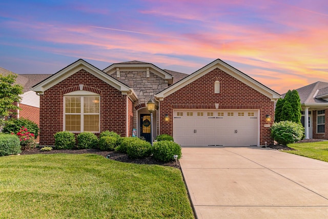 9733 Cobalt Way, Union, KY 41091 - traditional home with brick siding, a garage, and driveway