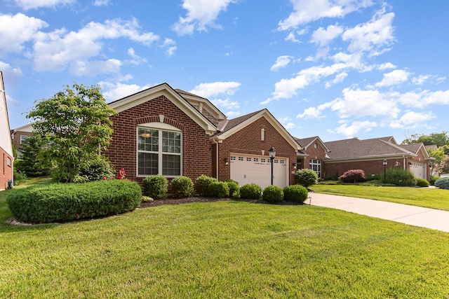 9733 Cobalt Way, Union, KY 41091 - view of front facade with brick siding, an attached garage, a front yard, and driveway