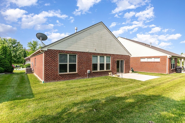 9733 Cobalt Way, Union, KY 41091 - rear view of property featuring a patio, brick siding, central AC, and a yard