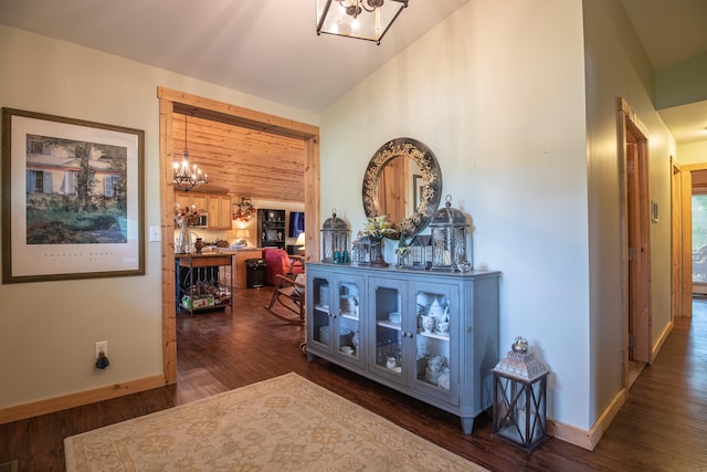 1145 Hillandale Dr, Sanders, KY 41083 - corridor with a chandelier, dark wood-style flooring, baseboards, and lofted ceiling