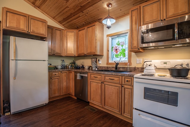 1145 Hillandale Dr, Sanders, KY 41083 - kitchen with stainless steel appliances, brown cabinetry, a sink, lofted ceiling, and dark countertops