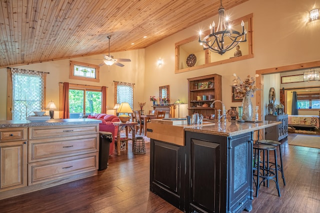 1145 Hillandale Dr, Sanders, KY 41083 - kitchen featuring a chandelier, ceiling fan, high vaulted ceiling, open floor plan, and a breakfast bar area