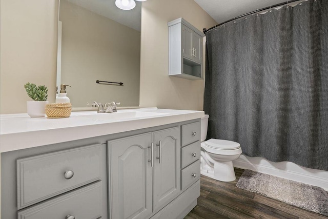 6161 Ridgewood Ct, Florence, KY 41042 - full bathroom featuring vanity, wood finished floors, and shower / bathtub combination with curtain