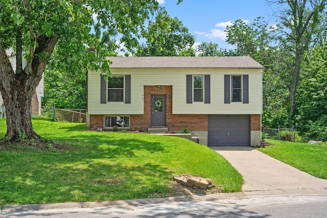 6161 Ridgewood Ct, Florence, KY 41042 - split foyer home featuring concrete driveway, a garage, and brick siding