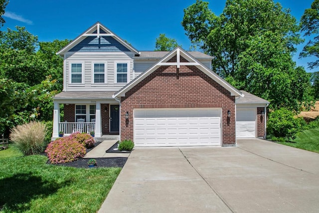 10056 Meadowvista Ct, Independence, KY 41051 - view of front facade featuring brick siding, a garage, a porch, and concrete driveway