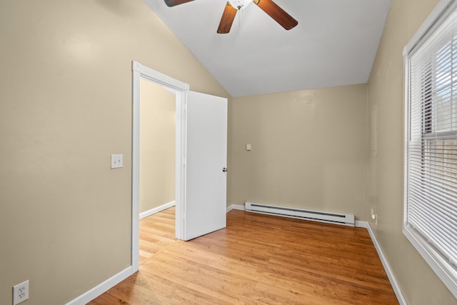 873 Buckeye Hills Rd, Falmouth, KY 41040 - unfurnished bedroom with a baseboard heating unit, lofted ceiling, light wood finished floors, baseboards, and ceiling fan