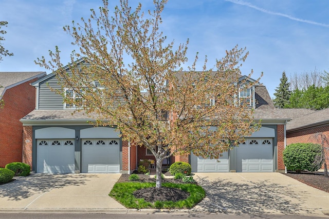2754 Mansion Pl, Crestview Hills, KY 41017 - traditional-style home with an attached garage, driveway, brick siding, and a shingled roof