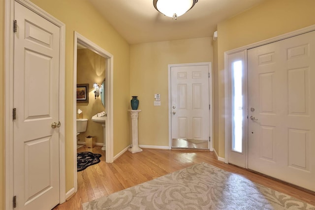 2754 Mansion Pl, Crestview Hills, KY 41017 - foyer entrance with light wood-type flooring and baseboards