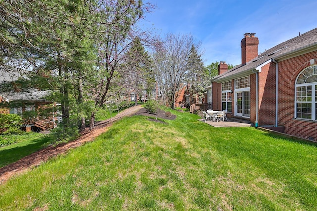 2754 Mansion Pl, Crestview Hills, KY 41017 - view of grassy yard with a patio
