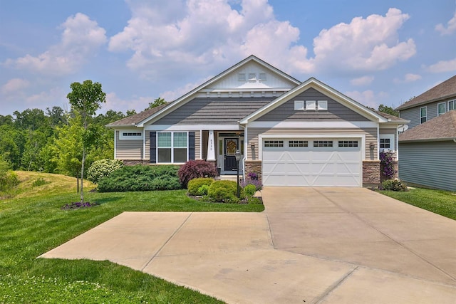 6520 Cannondale Dr, Burlington, KY 41005 - craftsman house featuring a front yard, concrete driveway, stone siding, and an attached garage