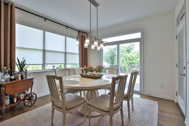 6520 Cannondale Dr, Burlington, KY 41005 - dining space with wood finished floors and baseboards