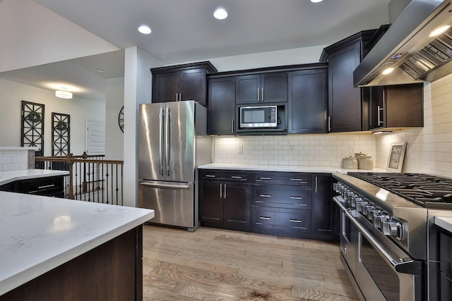 6520 Cannondale Dr, Burlington, KY 41005 - kitchen with stainless steel appliances, ventilation hood, decorative backsplash, light wood-style floors, and light stone counters