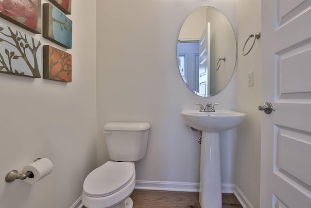 6520 Cannondale Dr, Burlington, KY 41005 - bathroom with toilet, baseboards, and a sink