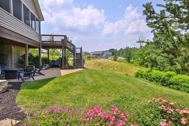 6520 Cannondale Dr, Burlington, KY 41005 - view of grassy yard featuring stairway, a deck, a fire pit, and a patio area