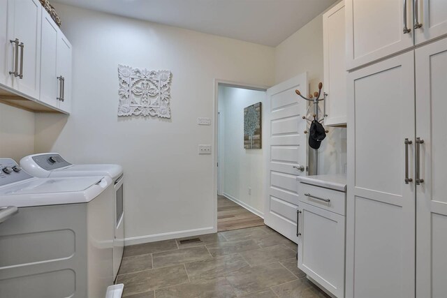 6520 Cannondale Dr, Burlington, KY 41005 - washroom with washing machine and clothes dryer, cabinet space, and baseboards