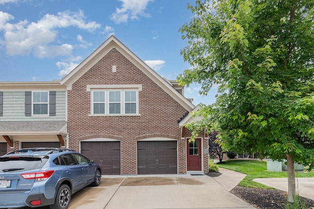 7483 Flintshire Dr Unit 5-305, Alexandria, KY 41001 - view of front facade featuring brick siding, an attached garage, and concrete driveway