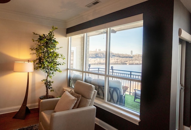 101 Harbor Greene Dr Unit W705, Bellevue, KY 41073 - living area with a water view, plenty of natural light, baseboards, wood finished floors, and ornamental molding