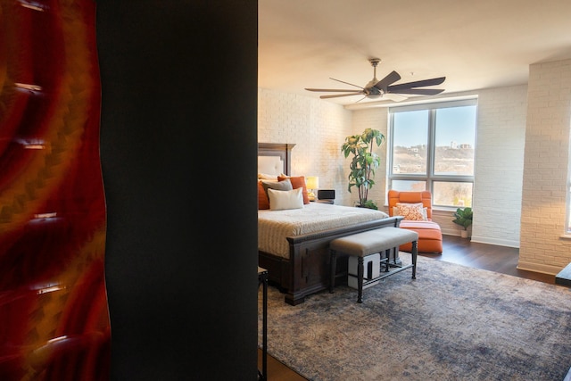101 Harbor Greene Dr Unit W705, Bellevue, KY 41073 - bedroom with brick wall, wood finished floors, a fireplace, and ceiling fan