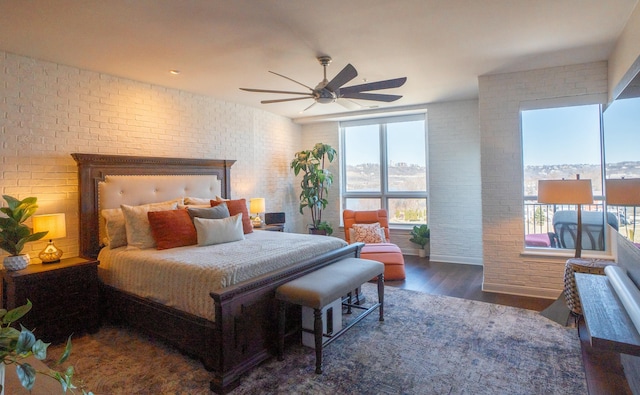 101 Harbor Greene Dr Unit W705, Bellevue, KY 41073 - bedroom with brick wall, wood finished floors, and a ceiling fan