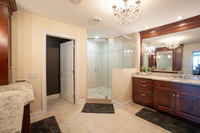 101 Harbor Greene Dr Unit W705, Bellevue, KY 41073 - bathroom with a chandelier, a shower stall, two vanities, baseboards, and recessed lighting