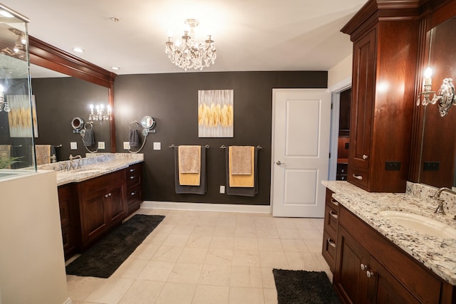 101 Harbor Greene Dr Unit W705, Bellevue, KY 41073 - full bathroom with a chandelier, two vanities, and baseboards