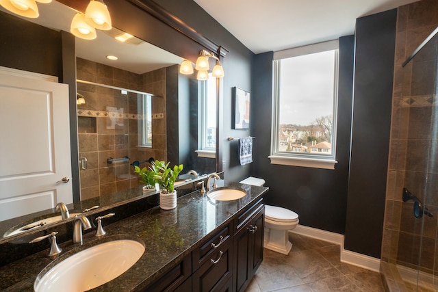 101 Harbor Greene Dr Unit W705, Bellevue, KY 41073 - full bath featuring double vanity, a stall shower, toilet, baseboards, and tile patterned flooring
