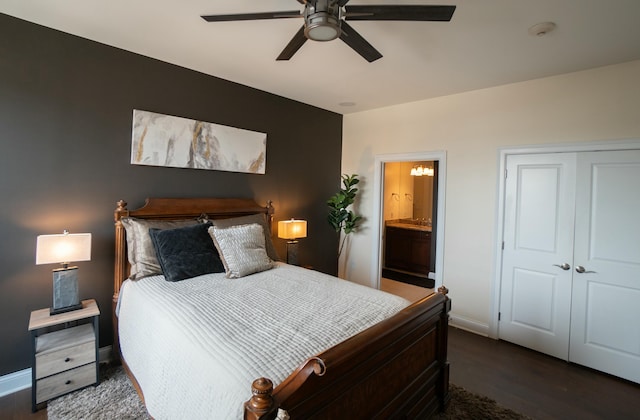 101 Harbor Greene Dr Unit W705, Bellevue, KY 41073 - bedroom with wood finished floors, baseboards, a ceiling fan, ensuite bathroom, and a closet