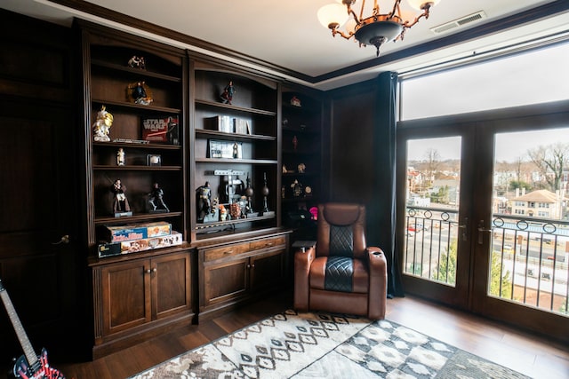 101 Harbor Greene Dr Unit W705, Bellevue, KY 41073 - sitting room featuring french doors, a chandelier, and wood finished floors