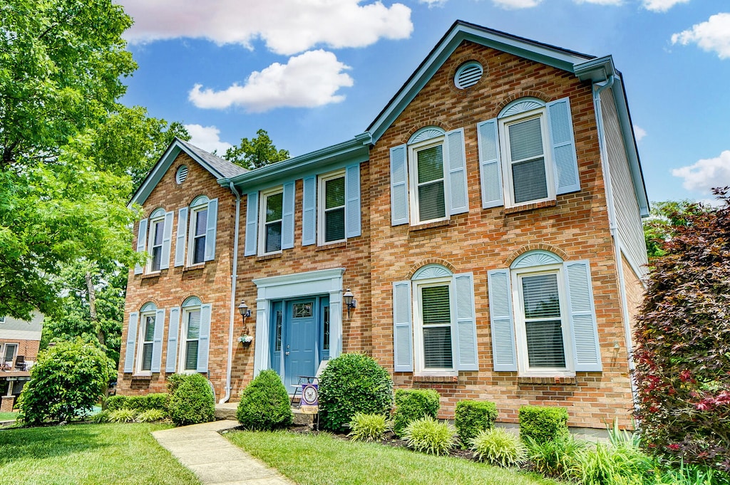 376 Marie Ln, Edgewood, KY 41017 - view of front of house with brick siding and a front lawn