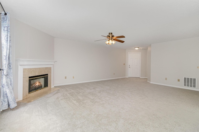 1546 Taramore Dr Unit 203, Florence, KY 41042 - unfurnished living room featuring a ceiling fan, a premium fireplace, light carpet, and baseboards