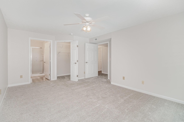 1546 Taramore Dr Unit 203, Florence, KY 41042 - unfurnished bedroom with carpet flooring, baseboards, a closet, and a spacious closet