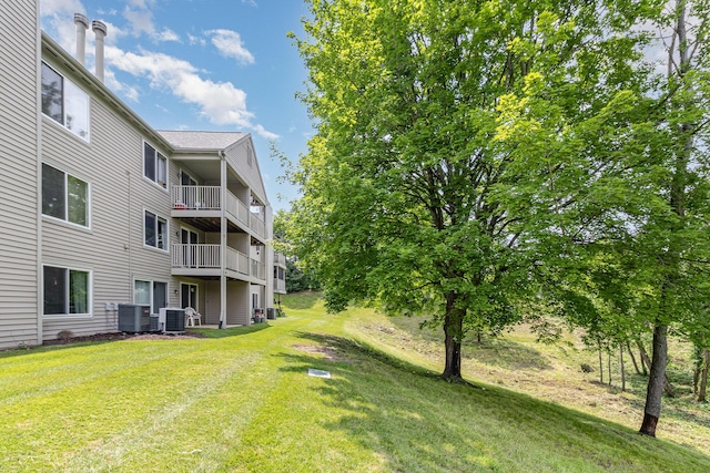 1546 Taramore Dr Unit 203, Florence, KY 41042 - view of green lawn with a balcony and cooling unit