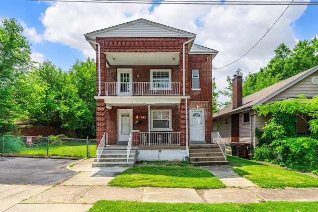 309 Hawthorne St, Covington, KY 41014 - multi unit property with a porch, brick siding, and a balcony