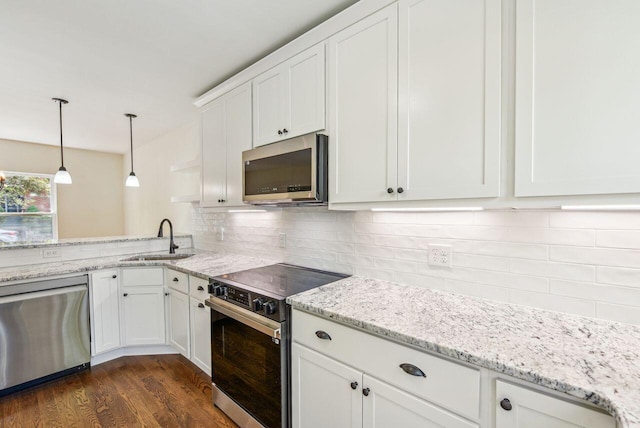 831 Linden Ave, Newport, KY 41071 - kitchen with stainless steel appliances, a sink, white cabinetry, and dark wood-style floors