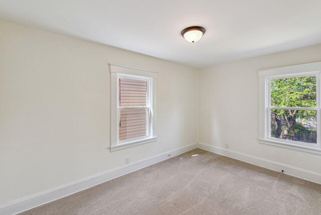 831 Linden Ave, Newport, KY 41071 - spare room featuring light colored carpet and baseboards