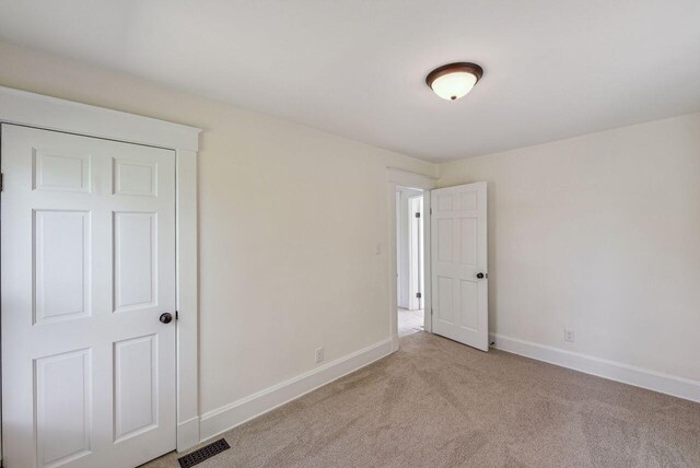 831 Linden Ave, Newport, KY 41071 - carpeted empty room featuring baseboards