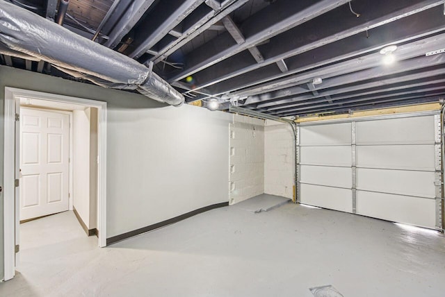 831 Linden Ave, Newport, KY 41071 - basement with baseboards and a garage