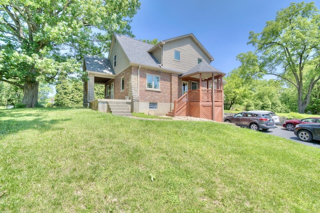 2641 Turkeyfoot Rd, Lakeside Park, KY 41017 - view of front of home featuring a front yard, stairs, brick siding, and roof with shingles