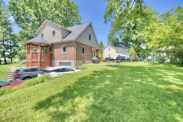2641 Turkeyfoot Rd, Lakeside Park, KY 41017 - view of front of property with brick siding, a front lawn, a shingled roof, and an attached garage