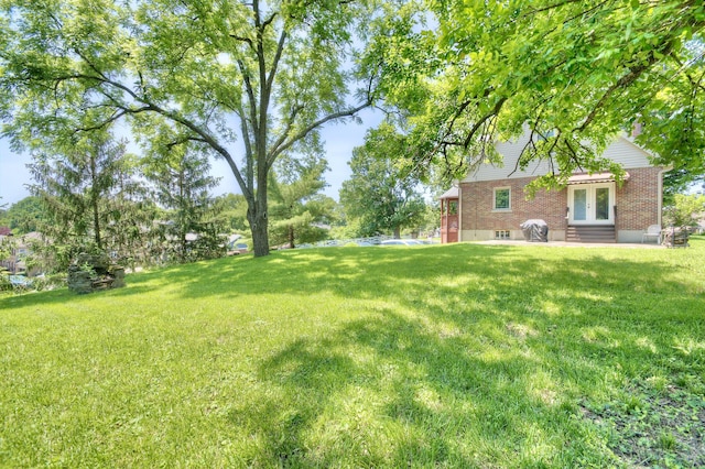 2641 Turkeyfoot Rd, Lakeside Park, KY 41017 - view of grassy yard with french doors